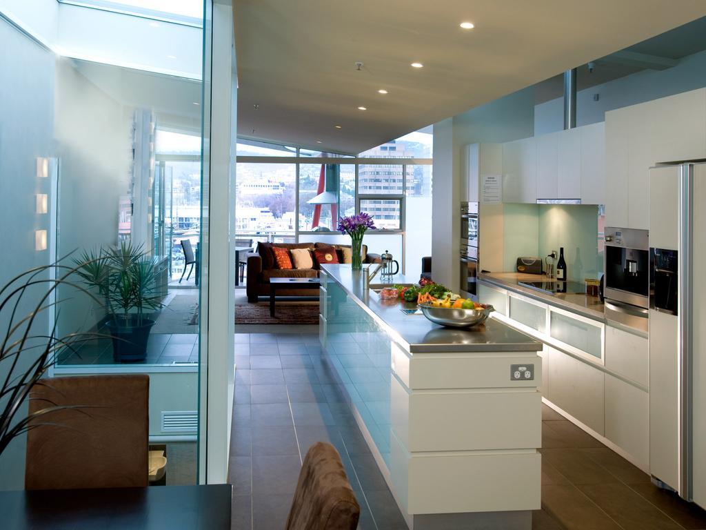 Sullivans Cove Apartments Хобарт Экстерьер фото A kitchen in a penthouse apartment