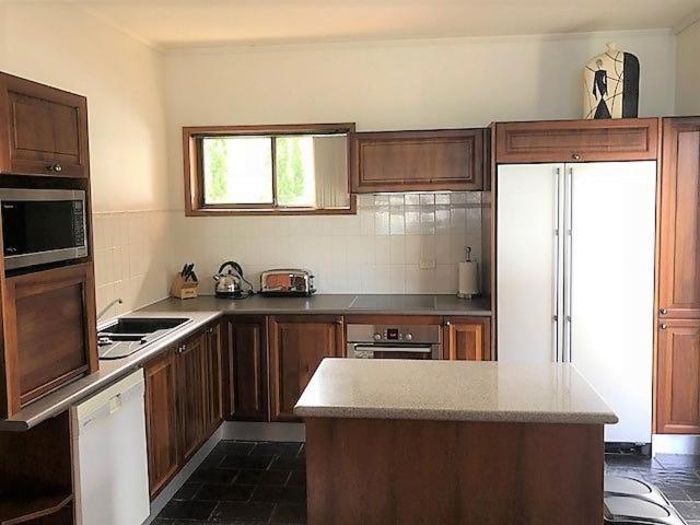 Sullivans Cove Apartments Хобарт Экстерьер фото A kitchen in a private house