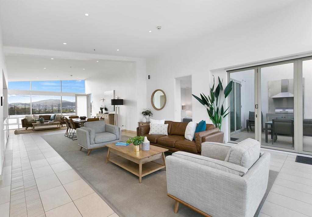 Sullivans Cove Apartments Хобарт Экстерьер фото A staged living room