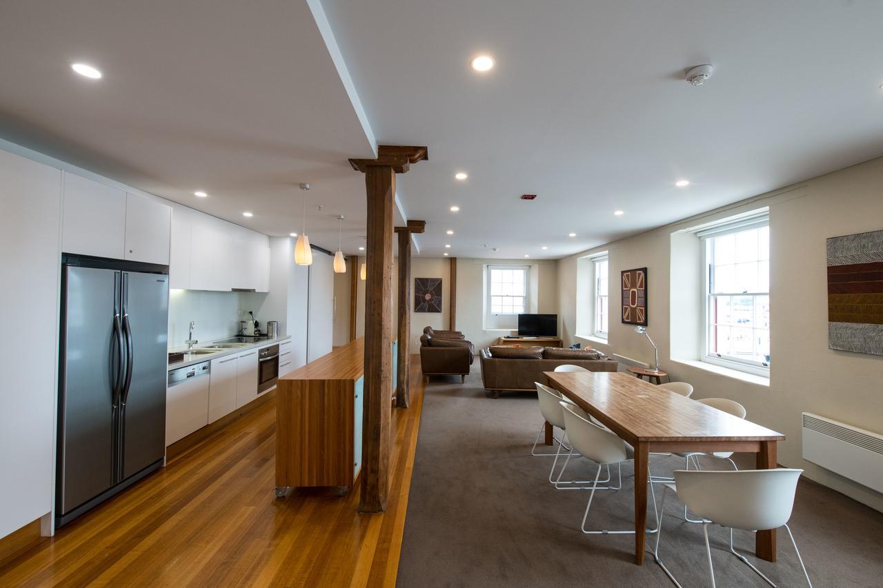 Sullivans Cove Apartments Хобарт Экстерьер фото The kitchen and living area of a typical apartment
