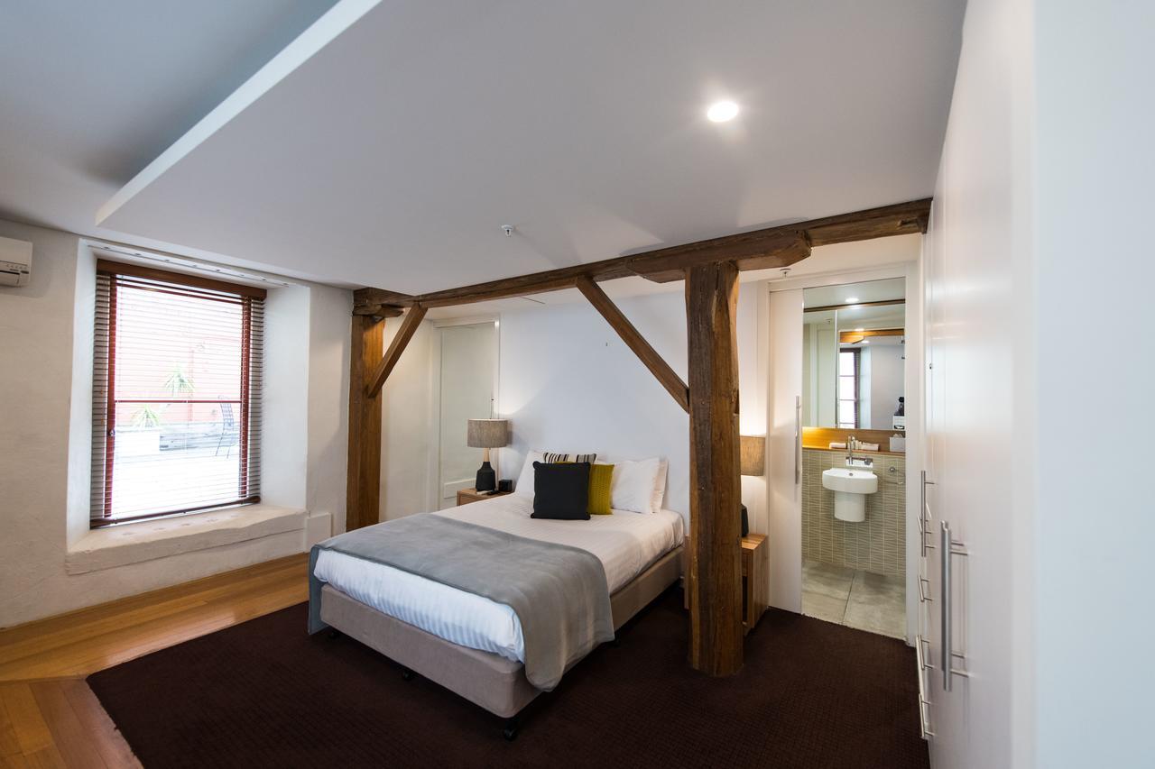 Sullivans Cove Apartments Хобарт Экстерьер фото A bedroom at the hotel